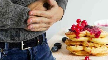 Почему возникает тяжесть в желудке?